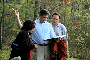 Stefani Koorey (left) and John Miranda (right), listen intently to Bill Goncalo’s tales of bygone Inerlachen.