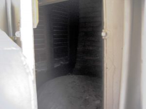 “little inner door that accesses space around the chimney”