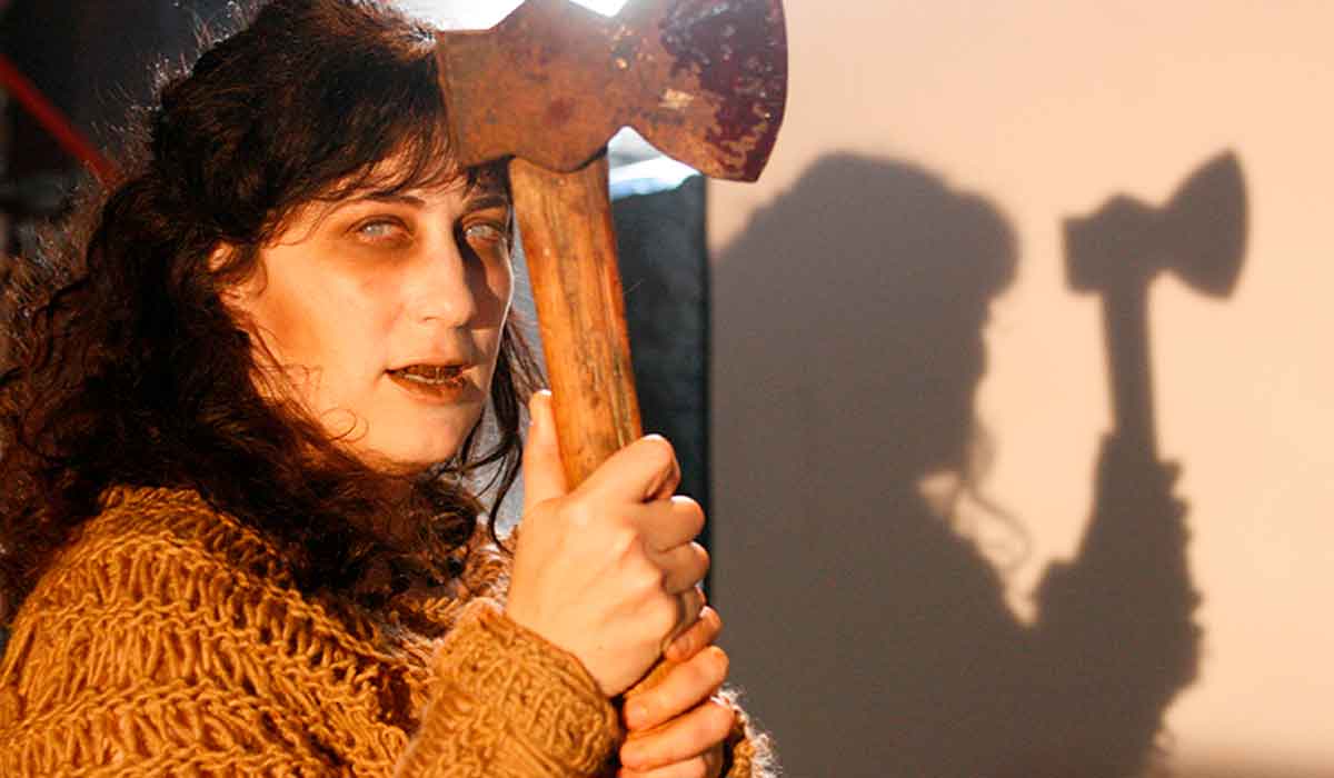 Cindy Baer as Lizzie Borden.
