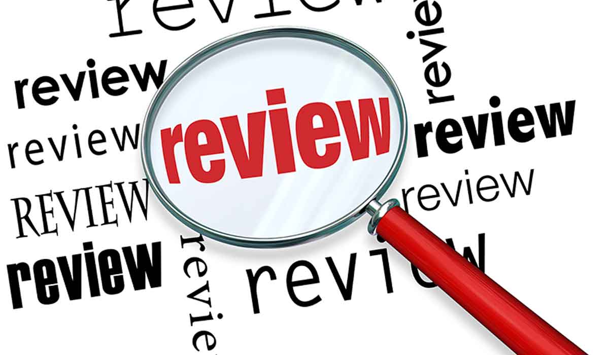 Word cloud with Review highlighted by magnifying glass.